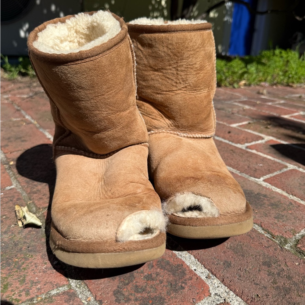 fluffy less worn light uggs with holes